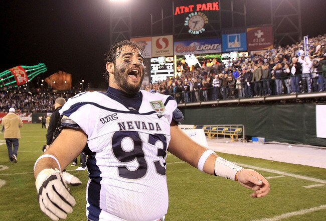 SAN FRANCISCO, CA - JANUARY 09:  Zack Madonick #93 of the Nevada Wolf Pack celebrates after beating Boston College in the Kraft Fight Hunger Bowl at AT&T Park on January 9, 2011 in San Francisco, California.  (Photo by Ezra Shaw/Getty Images)