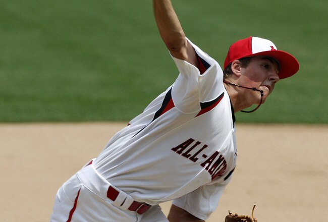 CHICAGO - AUGUST 8: Team One pitcher Kevin Gausman fires to the plate against the Baseball Factory  during the  Under Armour All-American Baseball game on August 8, 2009 at Wrigley Field in Chicago, Illinois.  (Photo by Jim Prisching/Getty Images)