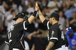 CHICAGO, IL - JUNE 21: Sergio Santos #46 and A.J. Pierzynski #12 of the Chicago White Sox celebrate their victory against the  Chicago Cubs on June 21, 2011 at U.S. Cellular Field in Chicago, Illinois. The White Sox defeated the Cubs 3-2.  (Photo by David Banks/Getty Images)