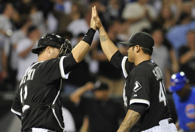 CHICAGO, IL - JUNE 21: Sergio Santos #46 and A.J. Pierzynski #12 of the Chicago White Sox celebrate their victory against the  Chicago Cubs on June 21, 2011 at U.S. Cellular Field in Chicago, Illinois. The White Sox defeated the Cubs 3-2.  (Photo by David Banks/Getty Images)