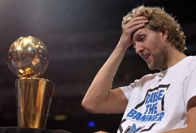 DALLAS, TX - JUNE 16:  Dirk Nowitzki of the Dallas Mavericks gets emotional after the Dallas Mavericks Victory Parade at American Airlines Center on June 16, 2011 in Dallas, Texas.  (Photo by Ronald Martinez/Getty Images)
