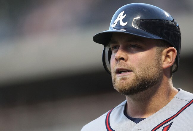 NEW YORK, NY - JUNE 03:  Brian McCann #16 of the Atlanta Braves at bat against the New York Mets at Citi Field on June 3, 2011 in the Flushing neighborhood of the Queens borough of New York City.  (Photo by Nick Laham/Getty Images)