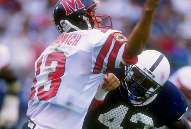 26 Aug 1992:  Inside linebacker Phil Yeboah-Kodie of the Penn State Nittany Lions puts pressure on the quarterback during a game against the Maryland Terrapins at Beaver Stadium in University Park, Pennsylvania.   Mandatory Credit: Doug Pensinger  /Allsport