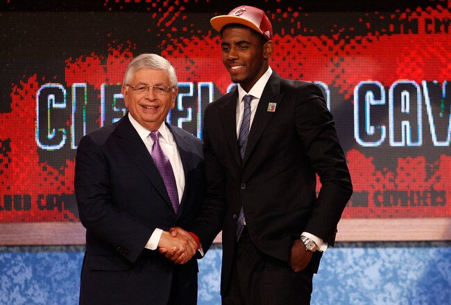 NEWARK, NJ - JUNE 23:  Kyrie Irving (R) from Duke greets NBA Commissioner David Stern after he was selected number one overall by the Cleveland Cavaliers in the first round during the 2011 NBA Draft at the Prudential Center on June 23, 2011 in Newark, New Jersey.  NOTE TO USER: User expressly acknowledges and agrees that, by downloading and/or using this Photograph, user is consenting to the terms and conditions of the Getty Images License Agreement.  (Photo by Mike Stobe/Getty Images)