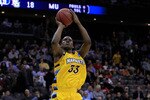 NEWARK, NJ - MARCH 25:  Jimmy Butler #33 of the Marquette Golden Eagles in action against the North Carolina Tar Heels during the east regional semifinal of the 2011 NCAA Men's Basketball Tournament at the Prudential Center on March 25, 2011 in Newark, New Jersey.  (Photo by Chris Trotman/Getty Images)
