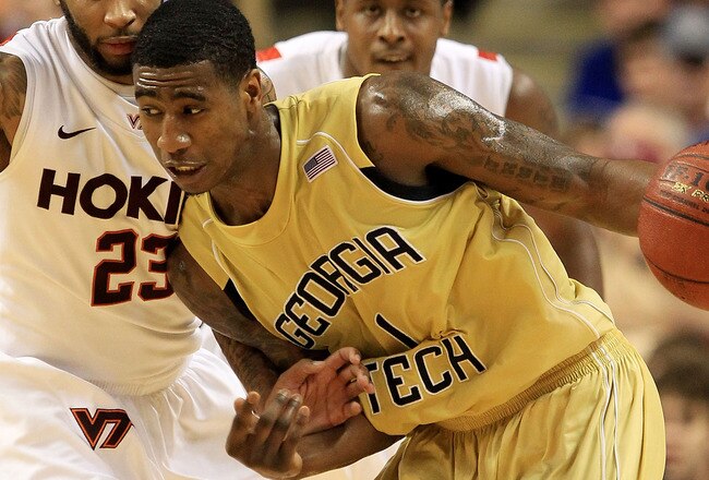 GREENSBORO, NC - MARCH 10:  Iman Shumpert #1 of the Georgia Tech Yellow Jackets drives against Malcolm Delaney #23 of the Virginia Tech Hokies during the first half of the game in the first round of the 2011 ACC men's basketball tournament at the Greensboro Coliseum on March 10, 2011 in Greensboro, North Carolina.  (Photo by Streeter Lecka/Getty Images)