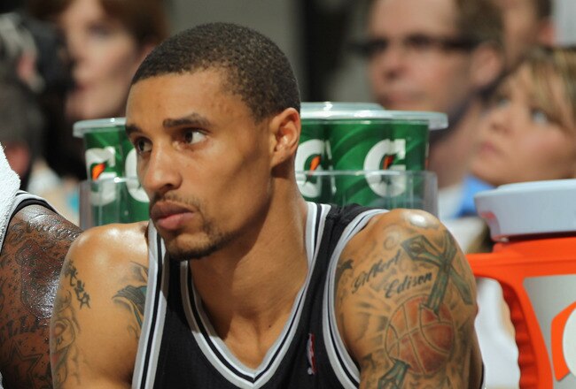DENVER, CO - MARCH 23:  DeJuan Blair #45 and George Hill #3 of the San Antonio Spurs sit on the bench against the Denver Nuggets at the Pepsi Center on March 23, 2011 in Denver, Colorado. The Nuggets defeated the Spurs 115-112. NOTE TO USER: User expressly acknowledges and agrees that, by downloading and or using this photograph, User is consenting to the terms and conditions of the Getty Images License Agreement.  (Photo by Doug Pensinger/Getty Images)