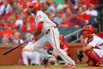 ST. LOUIS, MO - JUNE 23: Ben Francisco #10 of the Philadelphia Phillies hits a triple against the St. Louis Cardinals at Busch Stadium on June 23, 2011 in St. Louis, Missouri.  (Photo by Dilip Vishwanat/Getty Images)