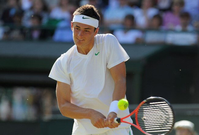 LONDON, ENGLAND - JUNE 25:  Bernard Tomic of Australia in action during his third round match against Robin Soderling of Sweden on Day Six of the Wimbledon Lawn Tennis Championships at the All England Lawn Tennis and Croquet Club on June 25, 2011 in London, England.  (Photo by Michael Regan/Getty Images)