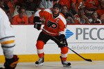 PHILADELPHIA, PA - APRIL 26:  Mike Richards #18 of the Philadelphia Flyers controls the puck against the Buffalo Sabres in Game Seven of the Eastern Conference Quarterfinals during the 2011 NHL Stanley Cup Playoffs at Wells Fargo Center on April 26, 2011 in Philadelphia, Pennsylvania.  (Photo by Bruce Bennett/Getty Images)