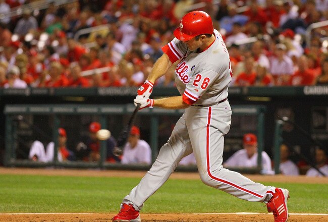 ST. LOUIS, MO - JUNE 22: Chase Utley #26 of the Philadelphia Phillies hits sacrifice RBI against the St. Louis Cardinals at Busch Stadium on June 22, 2011 in St. Louis, Missouri.  (Photo by Dilip Vishwanat/Getty Images)