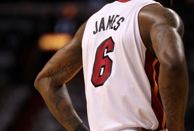 MIAMI, FL - JUNE 12:  LeBron James #6 of the Miami Heat looks on against the Dallas Mavericks in Game Six of the 2011 NBA Finals at American Airlines Arena on June 12, 2011 in Miami, Florida. NOTE TO USER: User expressly acknowledges and agrees that, by downloading and/or using this Photograph, user is consenting to the terms and conditions of the Getty Images License Agreement.  (Photo by Mike Ehrmann/Getty Images)