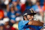 MOHALI, INDIA - MARCH 30:  M.S Dhoni of India batting during the 2011 ICC World Cup second Semi-Final between Pakistan and India at Punjab Cricket Association (PCA) Stadium on March 30, 2011 in Mohali, India.  (Photo by Graham Crouch/Getty Images)