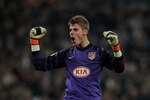 MADRID, SPAIN - JANUARY 13:  David De Gea of Atletico Madrid celebrates his sides opening goal during the quarter-final Copa del Rey first leg match between Real Madrid and Atletico Madrid at Estadio Santiago Bernabeu on January 13, 2011 in Madrid, Spain.  (Photo by Jasper Juinen/Getty Images)