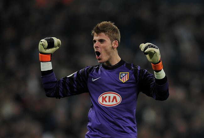 MADRID, SPAIN - JANUARY 13:  David De Gea of Atletico Madrid celebrates his sides opening goal during the quarter-final Copa del Rey first leg match between Real Madrid and Atletico Madrid at Estadio Santiago Bernabeu on January 13, 2011 in Madrid, Spain.  (Photo by Jasper Juinen/Getty Images)