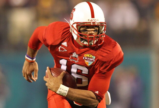 ORLANDO, FL - DECEMBER 28:  Russell Wilson #16 of the North Carolina State Wolfpack passes the ball during the Champs Sports Bowl against the West Virginia Mountineers at Florida Citrus Bowl Stadium on December 28, 2010 in Orlando, Florida.  (Photo by Mike Ehrmann/Getty Images)