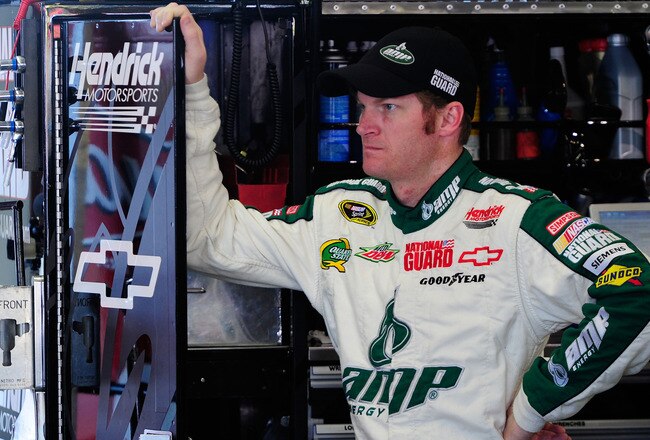 SONOMA, CA - JUNE 25:  Dale Earnhardt Jr., driver of the #88 Amp Energy/National Guard Chevrolet, stands in the garage area during practice for the NASCAR Sprint Cup Series Toyota/Save Mart 350 at Infineon Raceway on June 25, 2011 in Sonoma, California.  (Photo by Robert Laberge/Getty Images for NASCAR)