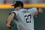 OMAHA, NE - JUNE 27:  Pitcher Forrest Koumas #27 of the South Carolina Gamecocks throws against the Florida Gators during game 1 of the men's 2011 NCAA College Baseball World Series at TD Ameritrade Park Omaha on June 27, 2011 in Omaha, Nebraska.  (Photo by Ronald Martinez/Getty Images)