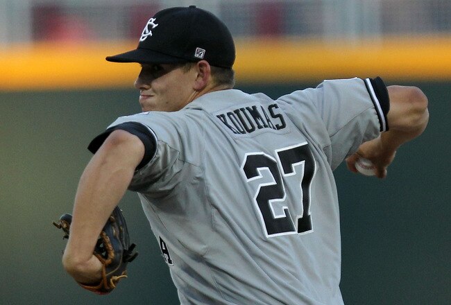 OMAHA, NE - JUNE 27:  Pitcher Forrest Koumas #27 of the South Carolina Gamecocks throws against the Florida Gators during game 1 of the men's 2011 NCAA College Baseball World Series at TD Ameritrade Park Omaha on June 27, 2011 in Omaha, Nebraska.  (Photo by Ronald Martinez/Getty Images)