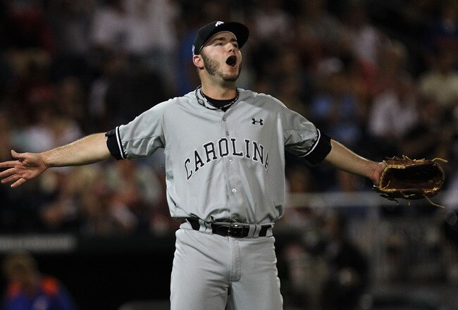 OMAHA, NE - JUNE 27:  Pitcher Matt Price #22 of the South Carolina Gamecocks reacts after the final out against the Florida Gators during game 1 of the men's 2011 NCAA College Baseball World Series at TD Ameritrade Park Omaha on June 27, 2011 in Omaha, Nebraska.  The Gamecocks beat the Gators 2-1.  (Photo by Ronald Martinez/Getty Images)