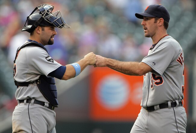 DENVER, CO - JUNE 19:  Catcher Alex Avila #13 and starting pitcher Justin Verlander #35 of the Detroit Tigers celebrate after their victory over the Colorado Rockies at Coors Field on June 19, 2011 in Denver, Colorado. Verlander pitched a complete game and earned the win as the Tigers defeated the Rockies 9-1.  (Photo by Doug Pensinger/Getty Images)
