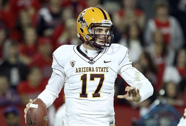 TUCSON, AZ - DECEMBER 02:  Quarterback Brock Osweiler #17 of the Arizona State Sun Devils scrambles with the football during the college football game at Arizona Stadium on December 2, 2010 in Tucson, Arizona. The Sun Devils defeated the Wildcats 30-29 in double overtime.  (Photo by Christian Petersen/Getty Images)
