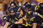 BATON ROUGE, LA - SEPTEMBER 25:  Quarterback Geno Smith #12 of the West Virginia Mountaineers in action against the Louisiana State University Tigers at Tiger Stadium on September 25, 2010 in Baton Rouge, Louisiana.  (Photo by Chris Graythen/Getty Images)