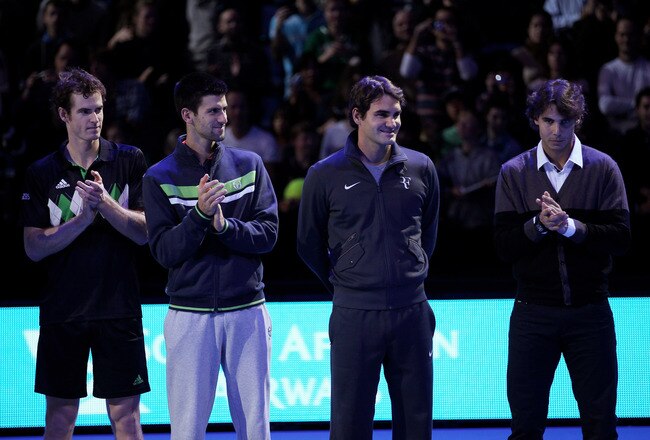 LONDON, ENGLAND - NOVEMBER 21:  (L-R) Andy Murray of Great Britain, Novak Djokovic of Siberia, Roger Federer of Switzerland and Rafael Nadal of Spain attend a ceremony for Carlos Moya's retirement during the Barclays ATP World Tour Finals at O2 Arena on November 21, 2010 in London, England.  (Photo by Clive Brunskill/Getty Images)