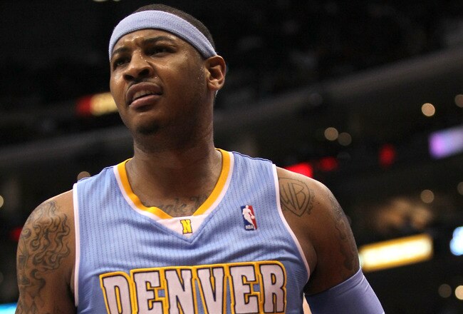 LOS ANGELES, CA - JANUARY 05:  Carmelo Anthony #15 of the Denver Nuggets reacts in the game against the Los Angeles Clippers at Staples Center on January 5, 2011  in Los Angeles, California.  The Clippers won 106-93.  NOTE TO USER: User expressly acknowledges and agrees that, by downloading and or using this photograph, User is consenting to the terms and conditions of the Getty Images License Agreement.  (Photo by Stephen Dunn/Getty Images)