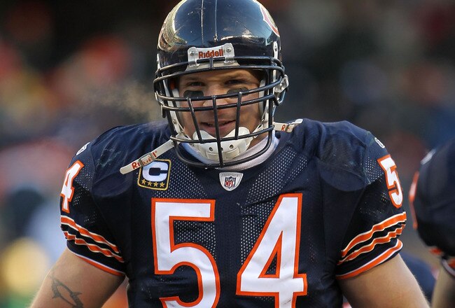 CHICAGO, IL - JANUARY 23:  Brian Urlacher #54 of the Chicago Bears smiles while taking on the Green Bay Packers in the NFC Championship Game at Soldier Field on January 23, 2011 in Chicago, Illinois.  (Photo by Jamie Squire/Getty Images)