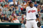 CLEVELAND - MAY 13:  Fausto Carmona #55 of the Cleveland Indians takes a moment to himself before pitching against the Seattle Mariners during the game on May 13, 2011 at Progressive Field in Cleveland, Ohio.  (Photo by Jared Wickerham/Getty Images)
