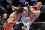 PORTLAND, OR - AUGUST 29:  UFC fighter Chris Leben (L) battles UFC fighter Jake Rosholt (R) during their Middleweight bout at UFC 102:  Couture vs. Nogueira at the Rose Garden Arena on August 29, 2009 in Portland, Oregon.  (Photo by Jon Kopaloff/Getty Images)