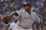 CHICAGO, IL - JUNE 19:  Starting pitcher C.C. Sabathia #52 of the New York Yankees delivers the ball against the Chicago Cubs at Wrigley Field on June 19, 2011 in Chicago, Illinois.  (Photo by Jonathan Daniel/Getty Images)