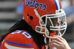 GAINESVILLE, FL - APRIL 9:  Coach Will Muschamp of the Florida Gators congratulates cornerback Moses Jenkins #36 during the Orange and Blue spring football game April 9, 2011 at Ben Hill Griffin Stadium in Gainesville, Florida.  (Photo by Al Messerschmidt/Getty Images)