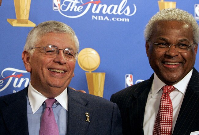 SAN ANTONIO - JUNE 21:  (L-R) Players representative Michael Curry, NBA commissioner David Stern and president of the NBA Players Association Billy Hunter pose together after a press conference announcing that the NBA and the NBA Players Association have agreed in principal on a new 6-year Collective Bargining Agreement (CBA) prior to Game 6 of the NBA Finals between the Detroit Pistons and the San Antonio Spurs on June 21, 2005 at SBC Center in San Antonio, Texas.  NOTE TO USER: User expressly acknowledges and agrees that, by downloading and/or using this Photograph, user is consenting to the terms and conditions of the Getty Images License Agreement.  (Photo by Brian Bahr/Getty Images)