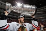 PHILADELPHIA - JUNE 09:  Jonathan Toews #19 of the Chicago Blackhawks hoists the Stanley Cup after teammate Patrick Kane scored the game-winning goal in overtime to defeat the Philadelphia Flyers 4-3 and win the Stanley Cup in Game Six of the 2010 NHL Stanley Cup Final at the Wachovia Center on June 9, 2010 in Philadelphia, Pennsylvania.  (Photo by Jim McIsaac/Getty Images)