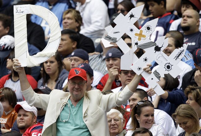 HOUSTON - NOVEMBER 28:  Houston Texans fans cheer on their defense againstd the Tennessee Titans at Reliant Stadium on November 28, 2010 in Houston, Texas.  (Photo by Bob Levey/Getty Images)