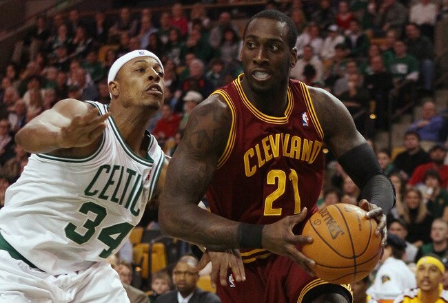 BOSTON, MA - JANUARY 25:  J.J. Hickson #21 of the of the Cleveland Cavaliers heads for the net as Paul Pierce #34 of the Boston Celtics defends on January 25, 2011 at the TD Garden in Boston, Massachusetts.   NOTE TO USER: User expressly acknowledges and agrees that, by downloading and/or using this Photograph, User is consenting to the terms and conditions of the Getty Images License Agreement.  (Photo by Elsa/Getty Images)