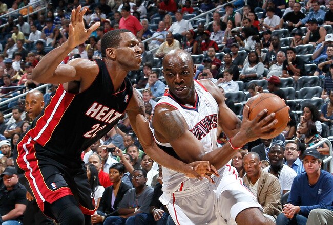 ATLANTA, GA - APRIL 11:  Damien Wilkins #3 of the Atlanta Hawks against James Jones #22 of the Miami Heat at Philips Arena on April 11, 2011 in Atlanta, Georgia.  NOTE TO USER: User expressly acknowledges and agrees that, by downloading and/or using this Photograph, user is consenting to the terms and conditions of the Getty Images License Agreement.  (Photo by Kevin C. Cox/Getty Images)