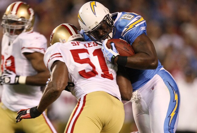 SAN DIEGO, CA - DECEMBER 16:  Linebacker Takeo Spikes #51 of the San Francisco 49ers hits tight end Randy McMichael #81 of the San Diego Chargers during their game at Qualcomm Stadium on December 16, 2010 in San Diego, California.  (Photo by Donald Miralle/Getty Images)