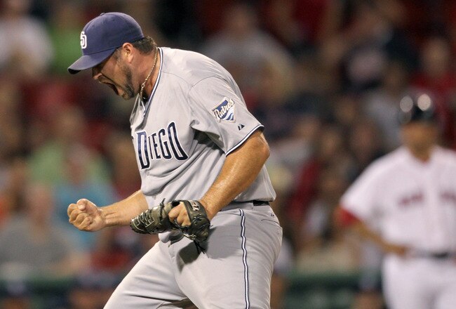 BOSTON, MA  - JUNE 21:  Heath Bell #21 of the San Diego Padres reacts in the ninth inning after a 5-4 win against the Boston Red Sox at Fenway Park on June 21, 2011 in Boston, Massachusetts.  (Photo by Jim Rogash/Getty Images)