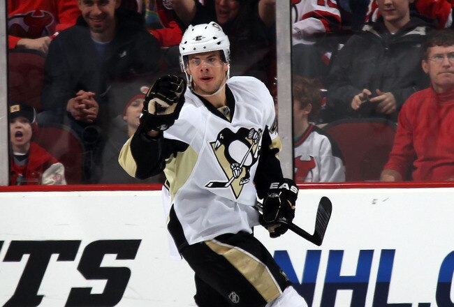NEWARK, NJ - MARCH 04:  Tyler Kennedy #48 of the Pittsburgh Penguins scores at 5:58 of the second period against the New Jersey Devils at the Prudential Center on March 4, 2011 in Newark, New Jersey.  (Photo by Bruce Bennett/Getty Images)