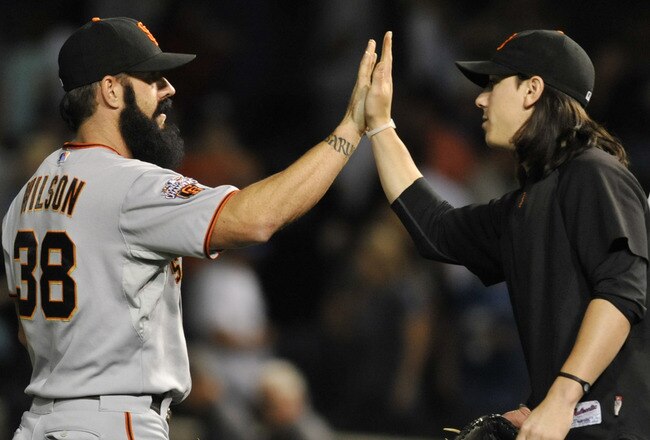 CHICAGO, IL - JUNE 28:  Brian Wilson #38 of the San Francisco Giants is greeted by Tim Lincecum #55 after the Chicago Cubs during the second game of a doubleheader  on June 28, 2011 at Wrigley Field in Chicago, Illinois. The Giants defeated the the Cubs 6-3.  (Photo by David Banks/Getty Images)