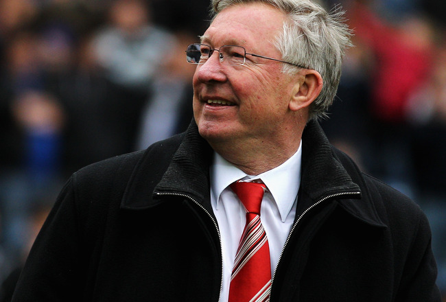 BLACKBURN, ENGLAND - MAY 14:  Manchester United Manager Sir Alex Ferguson smiles after drawing the Barclays Premier League match between Blackburn Rovers and Manchester United but winning the title at Ewood park on May 14, 2011 in Blackburn, England.  (Photo by Dean Mouhtaropoulos/Getty Images)