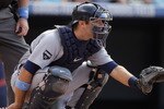 DENVER, CO - JUNE 19:  Catcher Alex Avila #13 of the Detroit Tigers backs up the plate against the Colorado Rockies at Coors Field on June 19, 2011 in Denver, Colorado. The Tigers defeated the Rockies 9-1.  (Photo by Doug Pensinger/Getty Images)