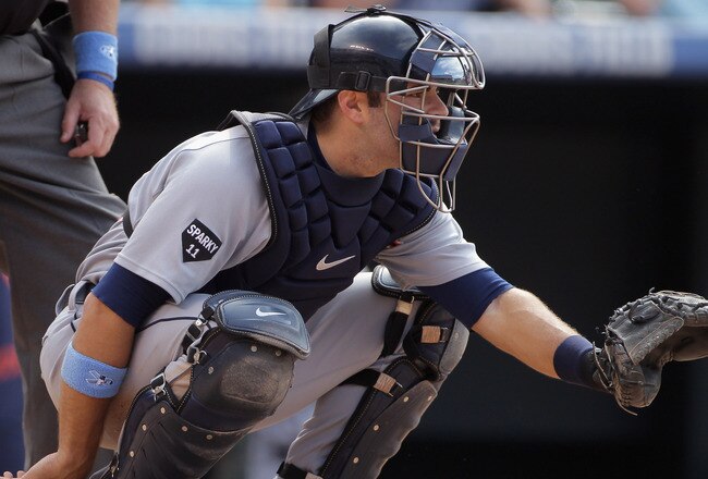 DENVER, CO - JUNE 19:  Catcher Alex Avila #13 of the Detroit Tigers backs up the plate against the Colorado Rockies at Coors Field on June 19, 2011 in Denver, Colorado. The Tigers defeated the Rockies 9-1.  (Photo by Doug Pensinger/Getty Images)