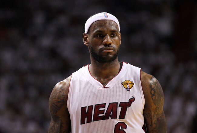 MIAMI, FL - JUNE 12:  LeBron James #6 of the Miami Heat looks on against the Dallas Mavericks in Game Six of the 2011 NBA Finals at American Airlines Arena on June 12, 2011 in Miami, Florida. NOTE TO USER: User expressly acknowledges and agrees that, by downloading and/or using this Photograph, user is consenting to the terms and conditions of the Getty Images License Agreement.  (Photo by Mike Ehrmann/Getty Images)