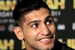 LOS ANGELES, CA - JUNE 08:  Amir Khan appears at a press conference with Zab Judah to discuss their upcoming Super Lightweight World Championship Unification Fight at ESPN Zone At L.A. Live on June 8, 2011 in Los Angeles, California.  (Photo by Stephen Dunn/Getty Images)