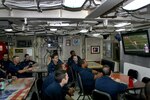 PACIFIC OCEAN - FEBRUARY 6, 2010: In this handout provided by the U.S. Navy, Sailors aboard the guided-missile submarine USS Ohio watch Super Bowl XLV in the crew's mess on February 6, 2011 while underway in the Pacific Ocean (Photo by Class Tristin Bomar/U.S. Navy via Getty Images)