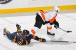 BUFFALO, NY - APRIL 20: Tim Connolly #19 of the Buffalo Sabres dives to stop Daniel Carcillo #13 of the Philadelphia Flyers in Game Four of the Eastern Conference Quarterfinals during the 2011 NHL Stanley Cup Playoffs at HSBC Arena at HSBC Arena on April 20, 2011 in Buffalo, New York.  (Photo by Rick Stewart/Getty Images)
